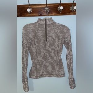 Lululemon half zip, worn 3 times, perfect condition, size 2
